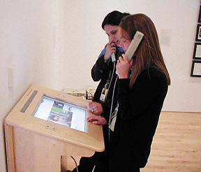 Figure 11: Visitors interacting with the in–gallery "Smart Table."